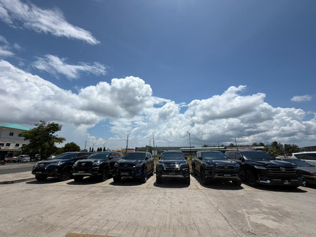 ZahraGO Toyota Fortuner rental fleet parked in a row, Sabah