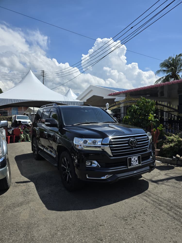 ZahraGO Toyota Land Cruiser parked outside a Sabah event venue