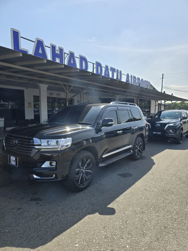 ZahraGO Toyota Land Cruiser parked at Lahad Datu Airport, Sabah