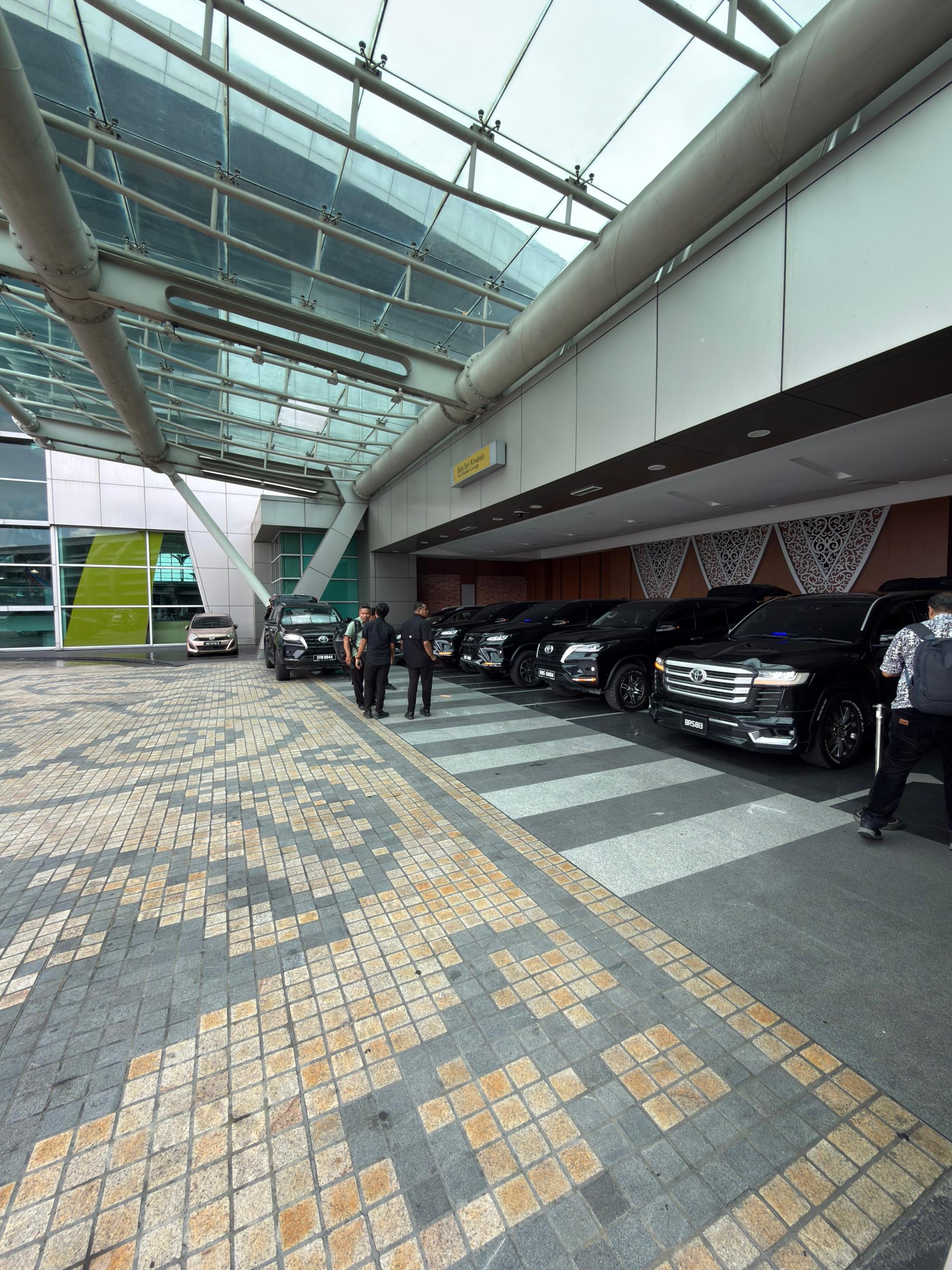 ZahraGO fleet vehicles lined up at Kota Kinabalu International Airport